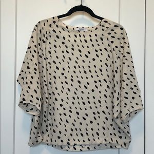 Black and ivory dotted batwing blouse